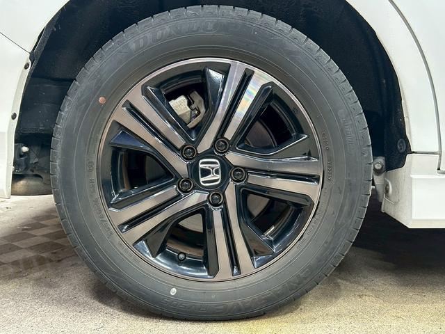 ステップワゴンスパーダ スパーダハイブリッドG・EXホンダセンシングブラスタ (禁煙車)(後期型)(黒半革シート)(後席モニター)(両側パワスラ)(純正ナビ)(バックカメラ)(レーダークルーズ)(シートヒーター)(ビルトインETC)(LEDヘッドライト)(純正16AW)(63枚目)