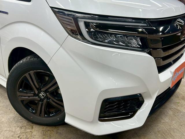ステップワゴンスパーダ スパーダハイブリッドG・EXホンダセンシングブラスタ (禁煙車)(後期型)(黒半革シート)(後席モニター)(両側パワスラ)(純正ナビ)(バックカメラ)(レーダークルーズ)(シートヒーター)(ビルトインETC)(LEDヘッドライト)(純正16AW)(65枚目)