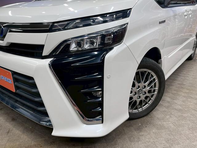 ヴォクシー ハイブリッドＺＳ　トヨタセーフティセンス（禁煙車）（後期型）（フリップダウンモニター）（社外ＳＤナビ）（クルーズコントロール）（シートヒーター）（バックカメラ）（オートマチックハイビーム）（純正１６インチＡＷ）（52枚目）