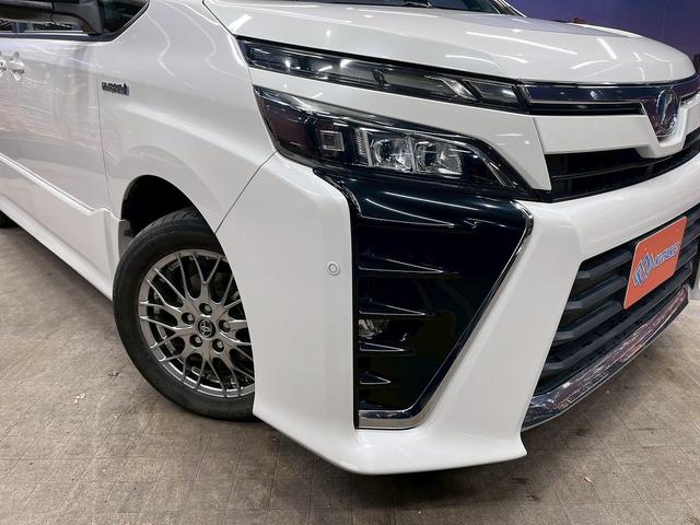 ヴォクシー ハイブリッドＺＳ　トヨタセーフティセンス（禁煙車）（後期型）（フリップダウンモニター）（社外ＳＤナビ）（クルーズコントロール）（シートヒーター）（バックカメラ）（オートマチックハイビーム）（純正１６インチＡＷ）（61枚目）