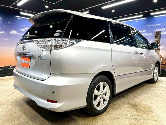 エスティマハイブリッド Ｇ　レザーパッケージ　（禁煙車）（７人乗り）（両側電動ドア）（フリップダウンモニター）（純正ＨＤＤナビ）（電動リアゲート）（シートヒーター）（パワーシート）（バックカメラ）（コーナーセンサー）（純正１７インチＡＷ）（26枚目）