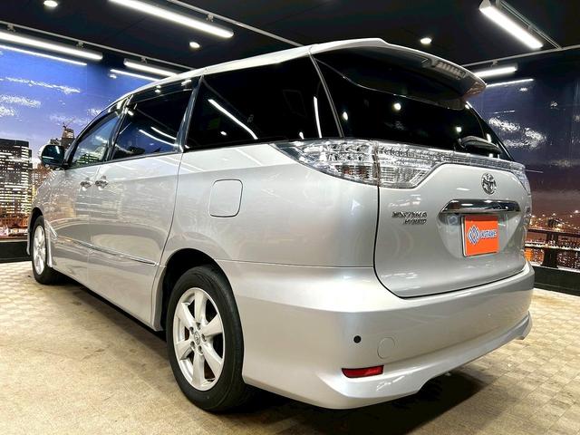 エスティマハイブリッド Ｇ　レザーパッケージ　（禁煙車）（７人乗り）（両側電動ドア）（フリップダウンモニター）（純正ＨＤＤナビ）（電動リアゲート）（シートヒーター）（パワーシート）（バックカメラ）（コーナーセンサー）（純正１７インチＡＷ）（28枚目）