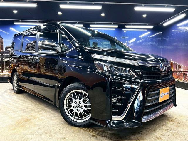 ヴォクシー ハイブリッドＺＳ　煌　（禁煙車）（後期型）（パワースライドドア）（純正ナビ）（ビルトインＥＴＣ）（クルーズコントロール）（シートヒーター）（両側スライドドア）（ウォークスルー）（ＬＥＤヘッドライト）（純正１６インチＡＷ）（24枚目）