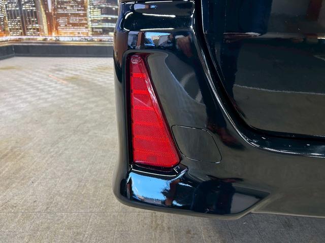 ヴォクシー ハイブリッドＺＳ　煌　（禁煙車）（後期型）（パワースライドドア）（純正ナビ）（ビルトインＥＴＣ）（クルーズコントロール）（シートヒーター）（両側スライドドア）（ウォークスルー）（ＬＥＤヘッドライト）（純正１６インチＡＷ）（33枚目）
