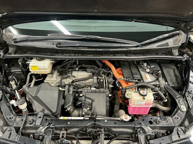 ヴォクシー ハイブリッドＺＳ　煌　（禁煙車）（後期型）（パワースライドドア）（純正ナビ）（ビルトインＥＴＣ）（クルーズコントロール）（シートヒーター）（両側スライドドア）（ウォークスルー）（ＬＥＤヘッドライト）（純正１６インチＡＷ）（36枚目）