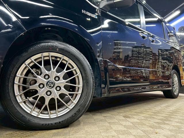 ヴォクシー ハイブリッドＺＳ　煌　（禁煙車）（後期型）（パワースライドドア）（純正ナビ）（ビルトインＥＴＣ）（クルーズコントロール）（シートヒーター）（両側スライドドア）（ウォークスルー）（ＬＥＤヘッドライト）（純正１６インチＡＷ）（59枚目）