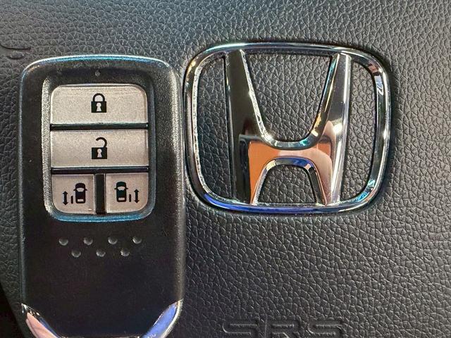 ステップワゴンスパーダ スパーダハイブリッド　Ｇ　ホンダセンシング　（禁煙車）（後期型）（両側パワースライド）（純正ナビ）（バックカメラ）（レーダークルーズ）（オートブレーキホールド）（ビルトインＥＴＣ）（ＬＥＤヘッド）（Ｂｌｕｅｔｏｏｔｈ対応）（純正１６インチＡＷ）（12枚目）