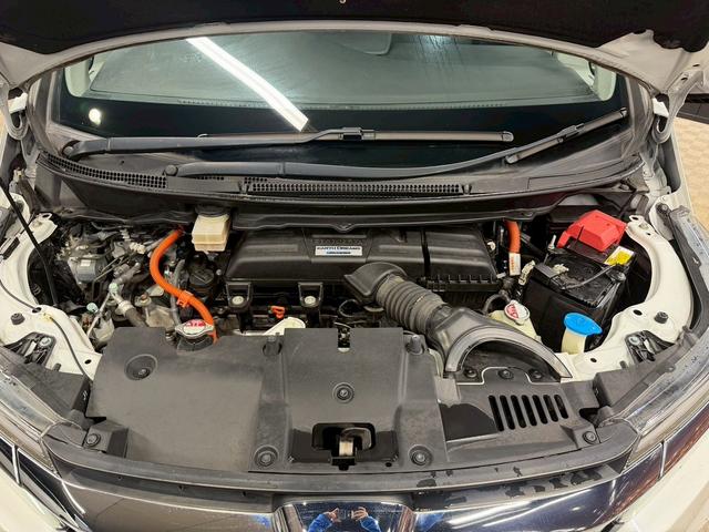 ステップワゴンスパーダ スパーダハイブリッド G・EX ホンダセンシング (後期型)(黒半革シート)(両側パワースライド)(純正メモリナビ)(全方位カメラ)(レーダークルーズ)(コーナーセンサー)(ビルトインETC)(電動パーキング)(シートヒーター)(純正16インチAW)(49枚目)