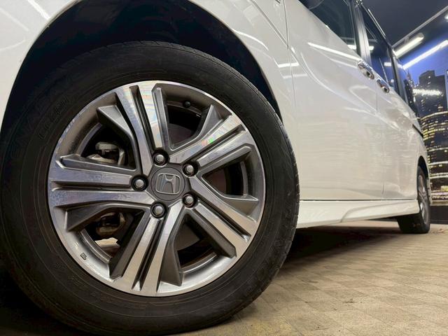 ステップワゴンスパーダ スパーダハイブリッド G・EX ホンダセンシング (後期型)(黒半革シート)(両側パワースライド)(純正メモリナビ)(全方位カメラ)(レーダークルーズ)(コーナーセンサー)(ビルトインETC)(電動パーキング)(シートヒーター)(純正16インチAW)(53枚目)