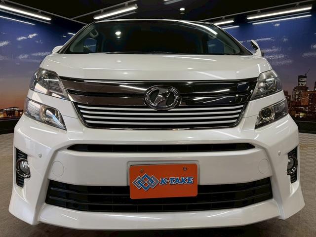 ヴェルファイア ２．４Ｚ　ゴールデンアイズＩＩ　（禁煙車）（後期型）（７人乗り）（両側パワースライド）（純正ＳＤナビ）（バックカメラ）（電動リアゲート）（黒ハーフレザー）（クリアランスソナー）（フリップダウン）（ＥＴＣ）（純正１８インチＡＷ）（26枚目）