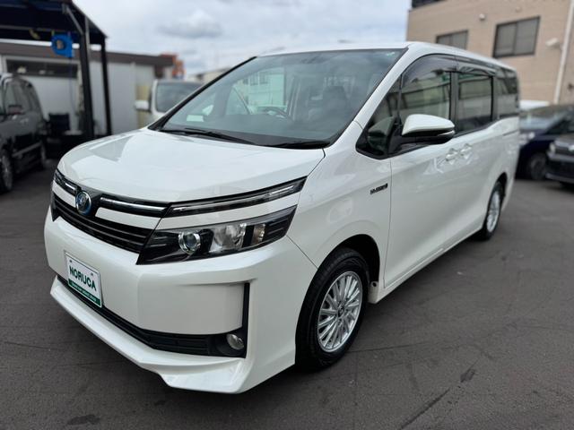 ヴォクシー ハイブリッドＶ　社外ナビ・ワンセグＴＶ・バックカメラ・ＥＴＣ・両側電動スライドドア・前席シートヒーター・オートクルーズコントロール・プッシュスタート・スマートキー・車両接近通報装置・トラクションコントロール・（14枚目）