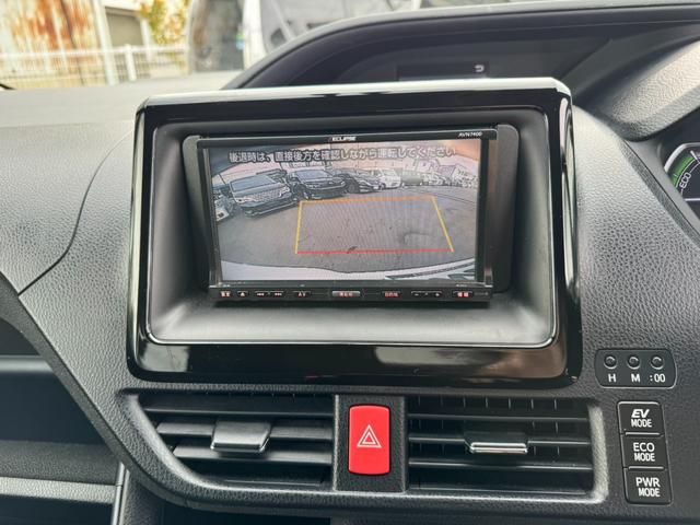 ヴォクシー ハイブリッドＶ　社外ナビ・ワンセグＴＶ・バックカメラ・ＥＴＣ・両側電動スライドドア・前席シートヒーター・オートクルーズコントロール・プッシュスタート・スマートキー・車両接近通報装置・トラクションコントロール・（36枚目）