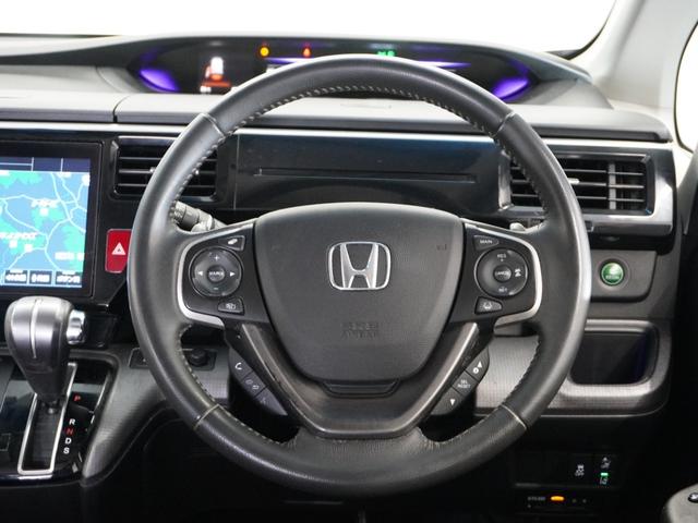 ステップワゴンスパーダ スパーダホンダセンシング　１年保証ナビ後席モニタＤレコＲカメＥＴＣ両電扉ＢＴ（11枚目）