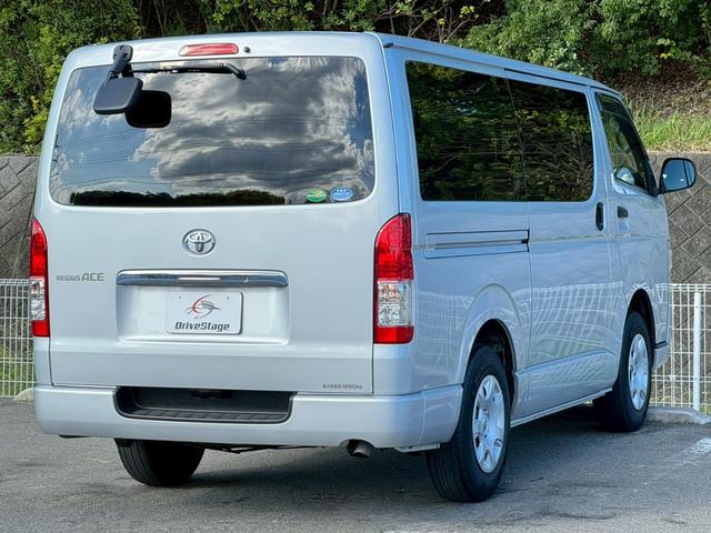 レジアスエースバン ロングＤＸ　ＧＬパッケージ　禁煙車　両側スライドドア　キーレスエントリー　運転席・助手席エアバック　電動格納ミラー　ＣＤプレーヤー　ＵＳＢ接続可　ＡＵＸ接続可　パワーウィンドウ　パワーステアリング　エアコン　６人乗り　車検整備付（7枚目）