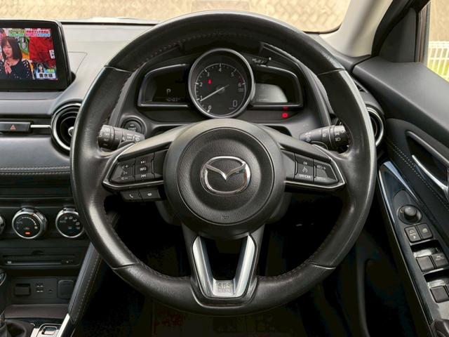 デミオ ＸＤツーリング　禁煙車　純正ナビ　フルセグ　クルコン　ブラインドスポットモニター　レーンキープ　シートヒーター　ＥＴＣ　ＨＵＤ　衝突軽減　ＬＥＤヘッドライト　純正１６インチＡＷ　パドルシフト　ＵＳＢ　ディーゼルターボ（9枚目）