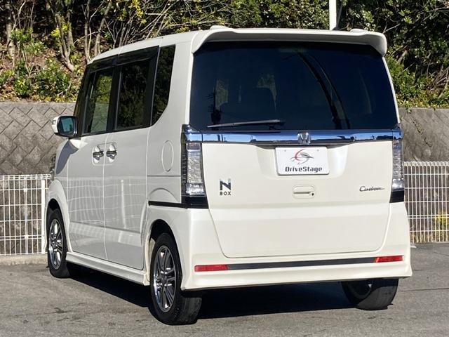 N-BOXカスタム G SSパッケージ ユーザー買取車 禁煙 社外8インチナビ バックカメラ ドラレコ 衝突軽減ブレーキ HIDヘッドライト 両側パワースライドドア シートヒーター フルセグ ETC レーダー探知機 純正14インチアルミ(12枚目)