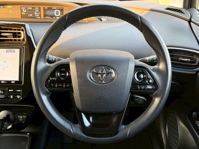 プリウス Aプレミアム ツーリングセレクション 禁煙車 純正9型ナビ バックカメラ 前後ドラレコ 黒革シート 前席シート冷暖 パーキングアシスト レーダークルーズ ヘッドアップディスプレイ LEDヘッドライト ETC 純正17インチAW 車検整備付(10枚目)
