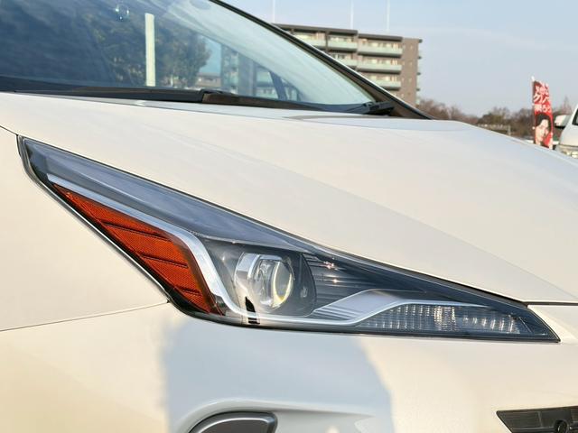 プリウス Aプレミアム ツーリングセレクション 禁煙車 純正9型ナビ バックカメラ 前後ドラレコ 黒革シート 前席シート冷暖 パーキングアシスト レーダークルーズ ヘッドアップディスプレイ LEDヘッドライト ETC 純正17インチAW 車検整備付(42枚目)