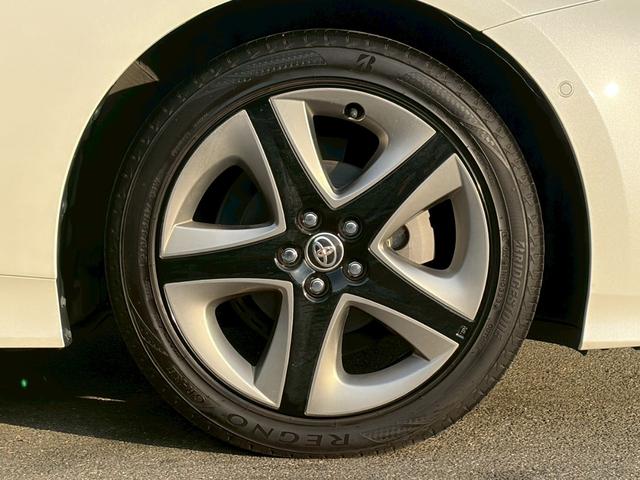 プリウス Aプレミアム ツーリングセレクション 禁煙車 純正9型ナビ バックカメラ 前後ドラレコ 黒革シート 前席シート冷暖 パーキングアシスト レーダークルーズ ヘッドアップディスプレイ LEDヘッドライト ETC 純正17インチAW 車検整備付(48枚目)
