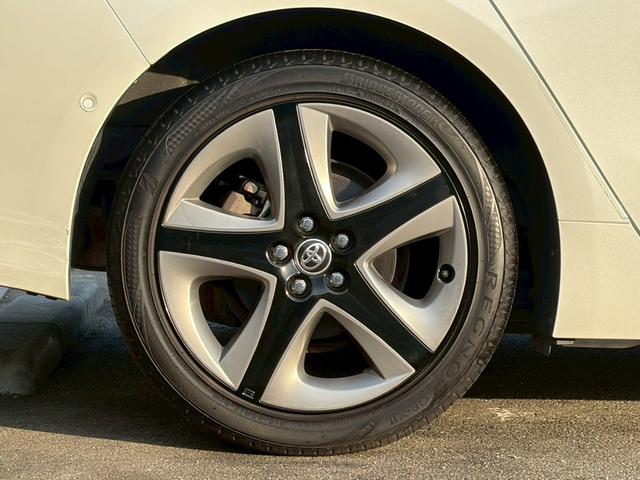 プリウス Aプレミアム ツーリングセレクション 禁煙車 純正9型ナビ バックカメラ 前後ドラレコ 黒革シート 前席シート冷暖 パーキングアシスト レーダークルーズ ヘッドアップディスプレイ LEDヘッドライト ETC 純正17インチAW 車検整備付(49枚目)