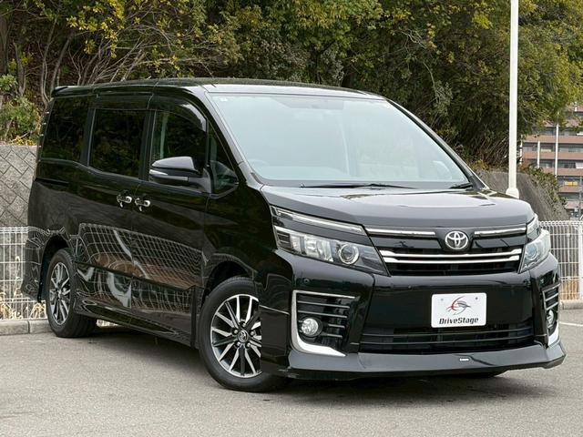 ヴォクシー ZS 禁煙車 社外マフラー モデリスタエアロ 純正9型ナビ フリップダウン 両側パワースライドドア バックカメラ フルセグ ドラレコ 前後クリソナ LED 純正16AW スマートキー 7人乗り 車検整備付(5枚目)