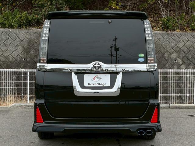 ヴォクシー ZS 禁煙車 社外マフラー モデリスタエアロ 純正9型ナビ フリップダウン 両側パワースライドドア バックカメラ フルセグ ドラレコ 前後クリソナ LED 純正16AW スマートキー 7人乗り 車検整備付(28枚目)
