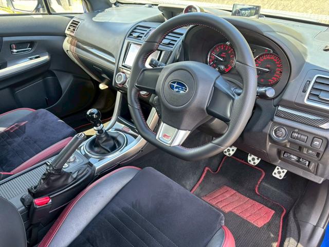 ＷＲＸ ＳＴＩ ＳＴＩ　禁煙　６ＭＴ　ユーザー買取　Ｔベルト交換済み　ＳＴＩフルエアロ　ＳＴＩマフラー　社外ナビ　バックカメラ　ＥＮＫＥＩ１８インチＡＷ　追加ブーストメーター　ブレンボキャリパー　レーダー探知機　法定点検整備（9枚目）