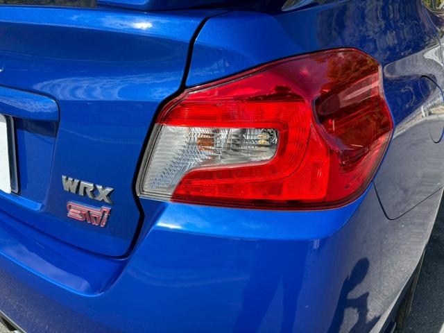 ＷＲＸ ＳＴＩ ＳＴＩ　禁煙　６ＭＴ　ユーザー買取　Ｔベルト交換済み　ＳＴＩフルエアロ　ＳＴＩマフラー　社外ナビ　バックカメラ　ＥＮＫＥＩ１８インチＡＷ　追加ブーストメーター　ブレンボキャリパー　レーダー探知機　法定点検整備（43枚目）