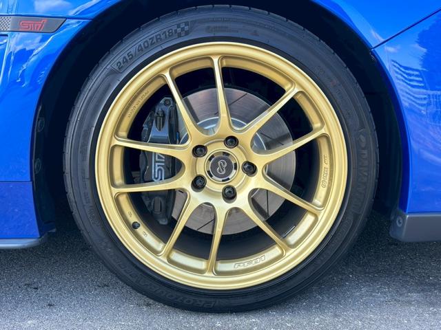 ＷＲＸ ＳＴＩ ＳＴＩ　禁煙　６ＭＴ　ユーザー買取　Ｔベルト交換済み　ＳＴＩフルエアロ　ＳＴＩマフラー　社外ナビ　バックカメラ　ＥＮＫＥＩ１８インチＡＷ　追加ブーストメーター　ブレンボキャリパー　レーダー探知機　法定点検整備（45枚目）
