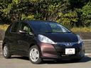 フィットハイブリッド ハイブリッド・10thアニバーサリー 車検整備付 ワンオーナー 禁煙 スマートキー ナビ フルセグ Bluetooth DVD 音楽録音 クルーズコントロール オートエアコン 革巻ステアリング ETC ハーフシェイドウインドウ スペアキ― 中古車画像_3