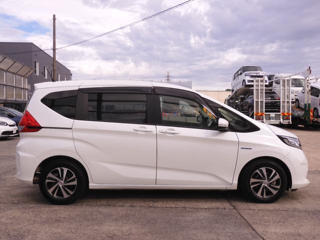 フリードハイブリッド ハイブリッド・ＥＸ　ワンオーナー　９インチナビ　バックカメラ　ドラレコ　ＥＴＣ　アダプティブクルーズコントロール　両側電動スライドドア　シートヒーター　Ｂｌｕｅｔｏｏｔｈ　ＬＥＤヘッドライト　禁煙車　いまコレ＋（26枚目）