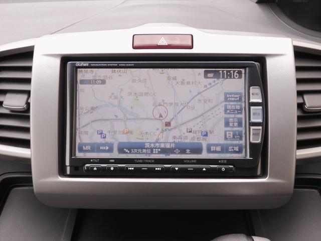 フリードハイブリッド ジャストセレクション ワンオーナー 7インチナビ バックカメラ ETC クルーズコントロール 両側電動スライドドア Bluetooth ディスチャージドライト 2列目ウォークスルー フルセグTV 純正アルミホイール 禁煙車(3枚目)