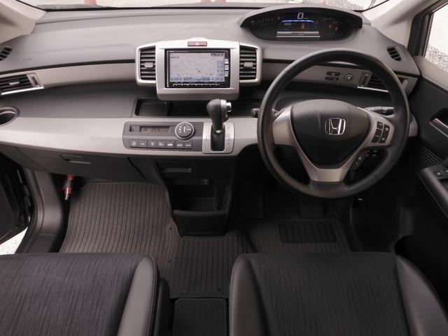 フリードハイブリッド ジャストセレクション ワンオーナー 7インチナビ バックカメラ ETC クルーズコントロール 両側電動スライドドア Bluetooth ディスチャージドライト 2列目ウォークスルー フルセグTV 純正アルミホイール 禁煙車(7枚目)