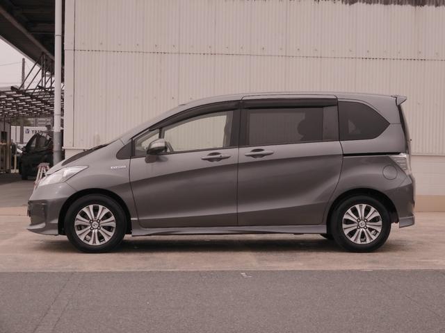 フリードハイブリッド ジャストセレクション ワンオーナー 7インチナビ バックカメラ ETC クルーズコントロール 両側電動スライドドア Bluetooth ディスチャージドライト 2列目ウォークスルー フルセグTV 純正アルミホイール 禁煙車(15枚目)