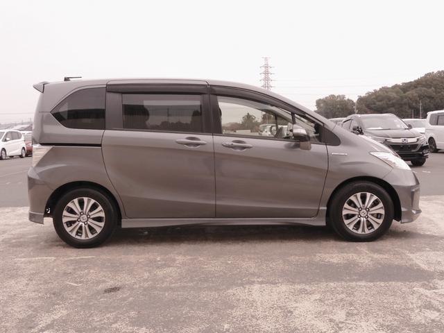 フリードハイブリッド ジャストセレクション ワンオーナー 7インチナビ バックカメラ ETC クルーズコントロール 両側電動スライドドア Bluetooth ディスチャージドライト 2列目ウォークスルー フルセグTV 純正アルミホイール 禁煙車(27枚目)