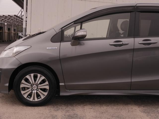 フリードハイブリッド ジャストセレクション ワンオーナー 7インチナビ バックカメラ ETC クルーズコントロール 両側電動スライドドア Bluetooth ディスチャージドライト 2列目ウォークスルー フルセグTV 純正アルミホイール 禁煙車(32枚目)