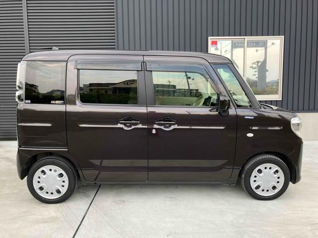 スペーシア ハイブリッドＸ　両側電動スライドドア　クリアランスソナー　レーンアシスト　衝突被害軽減システム　スマートキー　アイドリングストップ　シートヒーター　ベンチシート　ＣＶＴ　盗難防止システム　ＡＢＳ　ＥＳＣ　ＣＤ（8枚目）