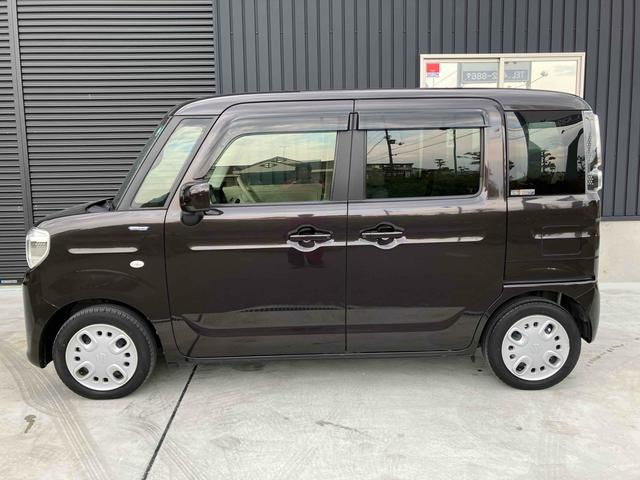 スペーシア ハイブリッドＸ　両側電動スライドドア　クリアランスソナー　レーンアシスト　衝突被害軽減システム　スマートキー　アイドリングストップ　シートヒーター　ベンチシート　ＣＶＴ　盗難防止システム　ＡＢＳ　ＥＳＣ　ＣＤ（9枚目）