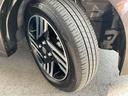 純正アルミホール・サイズは155/65R14。タイヤの溝も十分