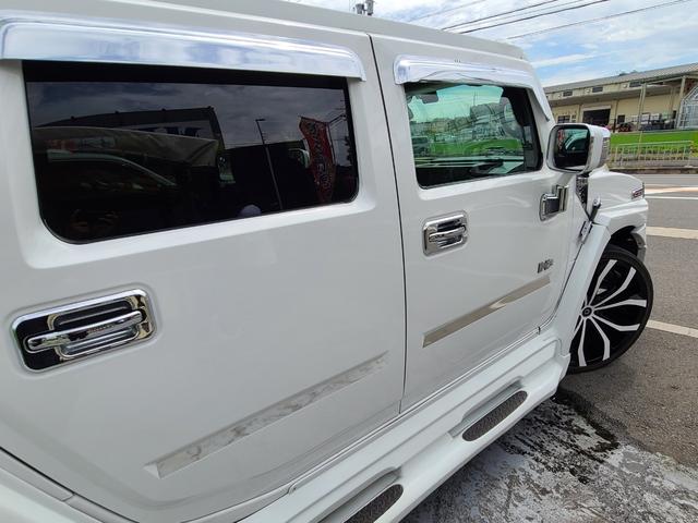 4WD/ABS/横滑り防止装置/エアバック(運転席)/サンルーフ/TV&ナビ/HDDナビ/TV(フルセグ)/DVD再生/革シート/パワーシート/AW26インチ/キーレスエントリー(2枚目)