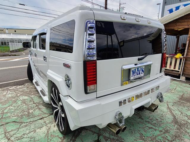 4WD/ABS/横滑り防止装置/エアバック(運転席)/サンルーフ/TV&ナビ/HDDナビ/TV(フルセグ)/DVD再生/革シート/パワーシート/AW26インチ/キーレスエントリー(7枚目)