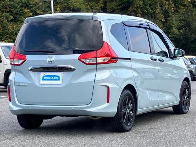 フリード Gブラックスタイル 純正 9インチ ナビ/フリップダウンモニター 純正 10.1インチ/ホンダセンシング/両側電動スライドドア/シートヒーター 前席/車線逸脱防止支援システム/ヘッドランプ LED 衝突被害軽減システム(3枚目)