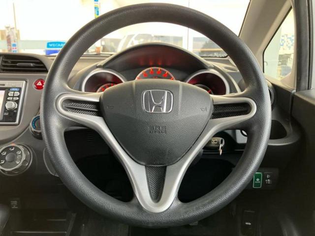 フィット １３Ｇ　新品タイヤ／純正　ＳＤナビ／ＥＴＣ／ＥＢＤ付ＡＢＳ／バックモニター／フルセグＴＶ／ＤＶＤ／パワーウインドウ／キーレスエントリー／パワーステアリング／盗難防止システム／マニュアルエアコン　バックカメラ（15枚目）