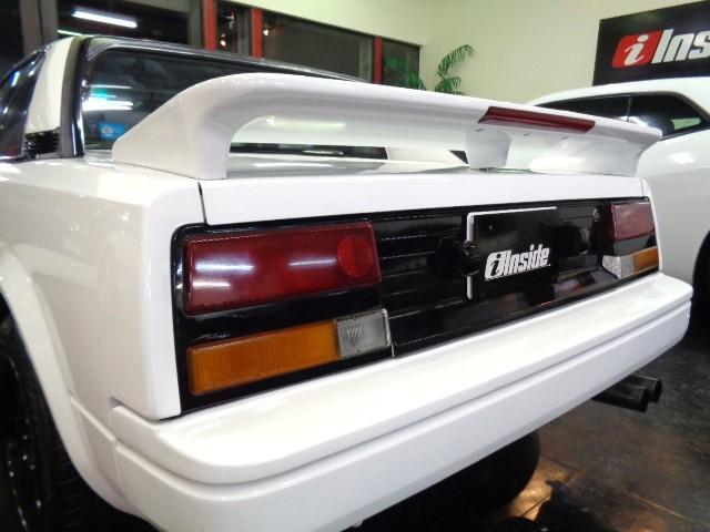 ＭＲ２ Ｓ　スーパーホワイトカラーフルエアロノーマルルーフ３Ａ－ＬＵミッドシップエンジン純正５ＭＴミッション専用２本出しマフラーレカロシートＷＯＲＫアルミＲスポイラールーフスポイラー七宝焼エンブレムＴベルト交換済（18枚目）