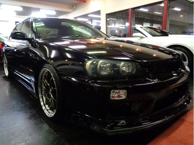 スカイライン 25GT-Xターボ ブラックカラーフルエアロRB25DETターボNEO6エンジン5MTミッションデュアルマフラーBLITZエアクリインターC車高調プロフェックKOYOラジエター対向キャリパーSSR19アルミTベルト交換済(2枚目)