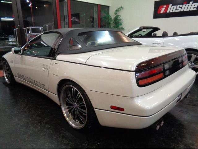 フェアレディＺ コンバーチブル　ＶＧ３０ＤＥＶ６エンジン純正５ＭＴミッション４本出しマフラーＴＥＩＮ車高調対向キャリパーＳＴＥＩＮＥＲ１９アルミホワイトパールカラーブラックＴＯＰホワイトベージュレザーインテリアＨＩＤＴベルト交換済（29枚目）