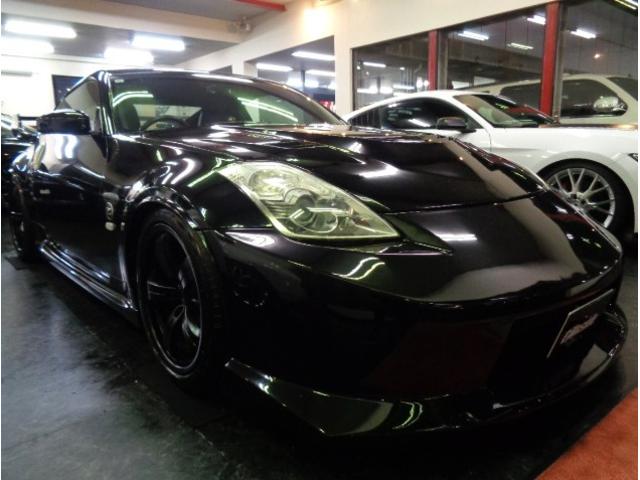フェアレディZ バージョンニスモ NISMOエアロN1ロングノーズVQ35HRエンジン313PS6MTニスモマフラー車高調ブレンボキャリパーRAYSアルミエアロボンネットニスモ260kmメータ黒革シートVeilsideリアスポナビTV(2枚目)