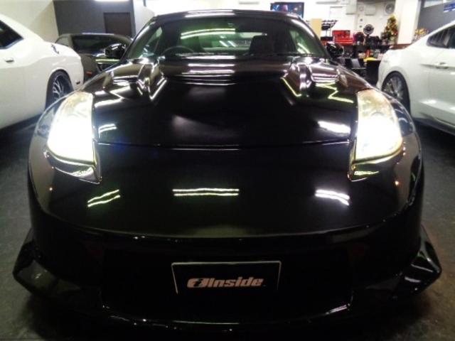 フェアレディZ バージョンニスモ NISMOエアロN1ロングノーズVQ35HRエンジン313PS6MTニスモマフラー車高調ブレンボキャリパーRAYSアルミエアロボンネットニスモ260kmメータ黒革シートVeilsideリアスポナビTV(9枚目)