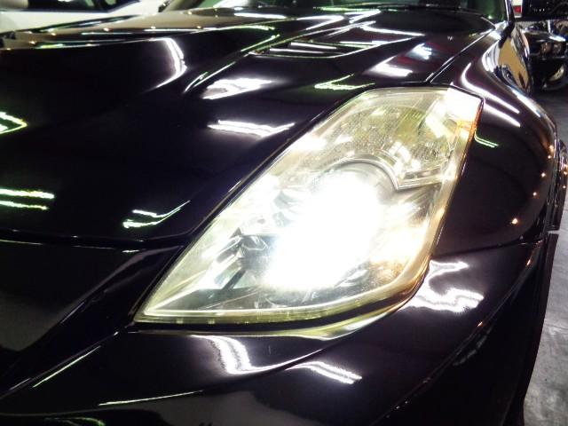 フェアレディZ バージョンニスモ NISMOエアロN1ロングノーズVQ35HRエンジン313PS6MTニスモマフラー車高調ブレンボキャリパーRAYSアルミエアロボンネットニスモ260kmメータ黒革シートVeilsideリアスポナビTV(10枚目)