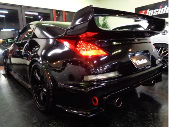 フェアレディZ バージョンニスモ NISMOエアロN1ロングノーズVQ35HRエンジン313PS6MTニスモマフラー車高調ブレンボキャリパーRAYSアルミエアロボンネットニスモ260kmメータ黒革シートVeilsideリアスポナビTV(12枚目)